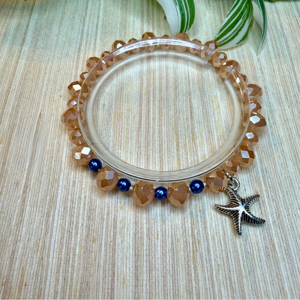 Peach Glass Bead Stretch Bracelet with Starfish Charm & Blue Accents | Handmade